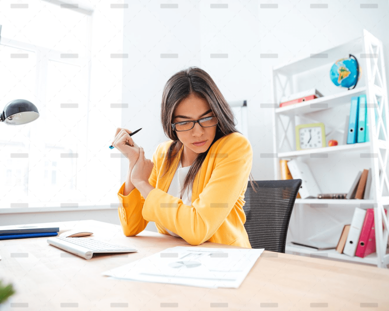 demo-attachment-449-businesswoman-analysing-document-P8WSNMC